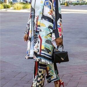 Add some bold prints to your wardrobe with this two-piece Kimono and Pants set!